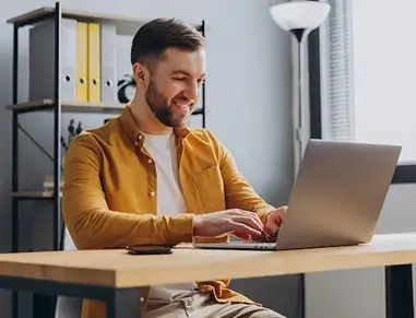 Guy Using Quote Rocket For Insurance Quotes